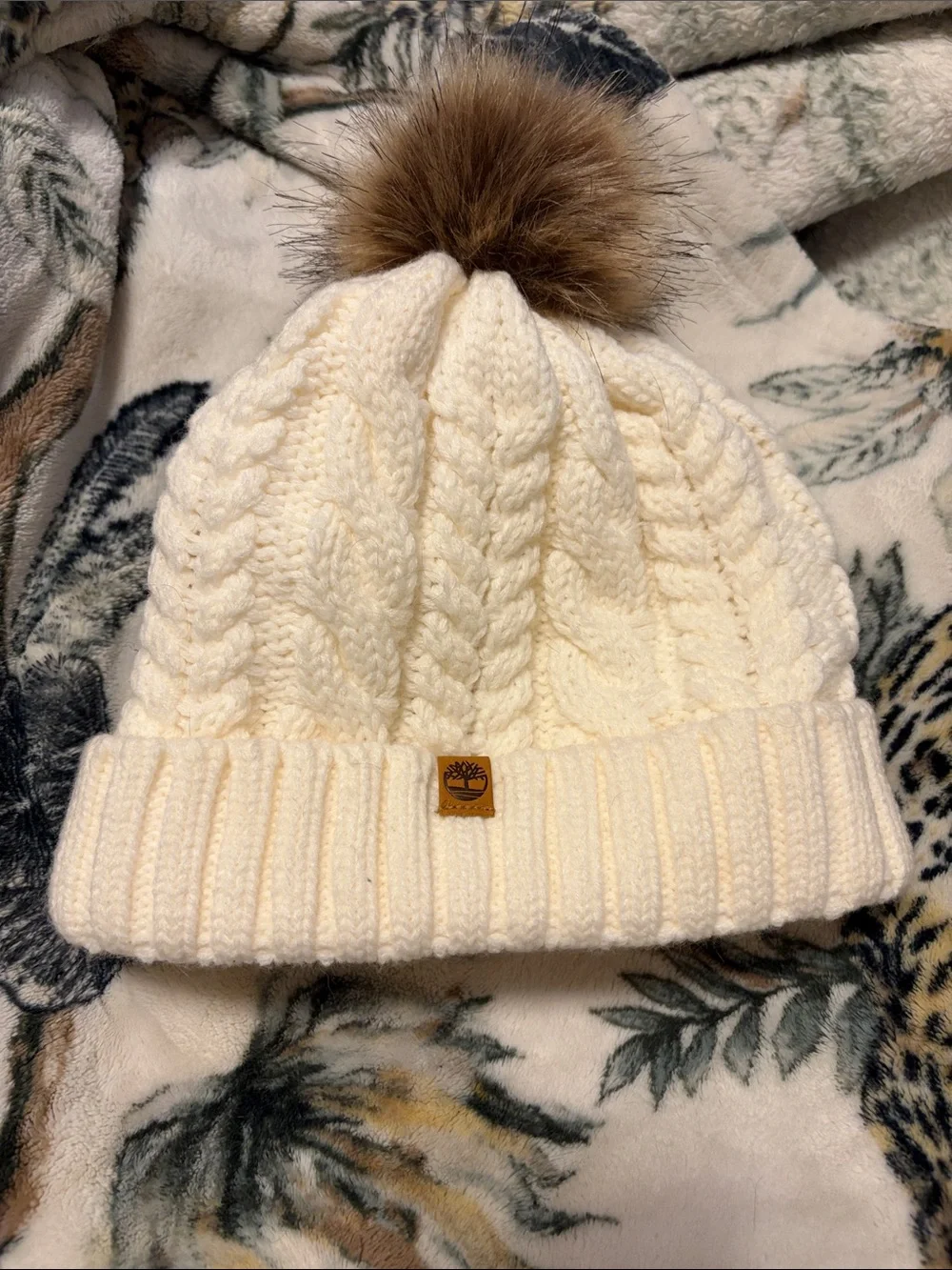 Timberland Cream Cable-Knit Beanie with Brown Faux Fur Pom